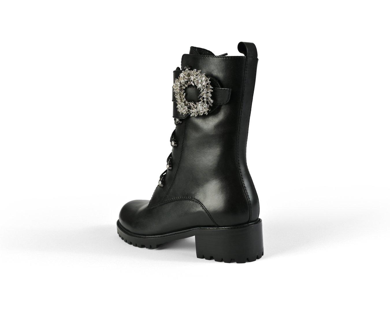 Black combat boots with lace-up design - back view