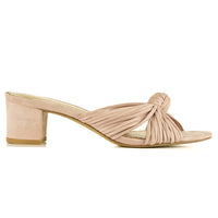 Blush colored women's sandals with knot design upper - side view