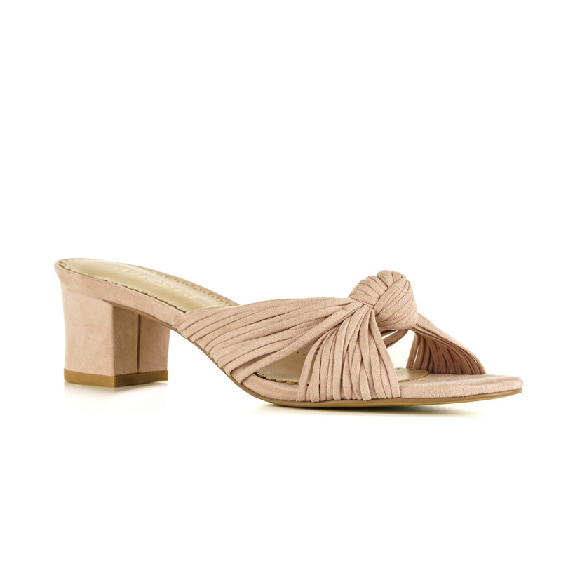 Blush colored women's sandals with knot design upper - corner view