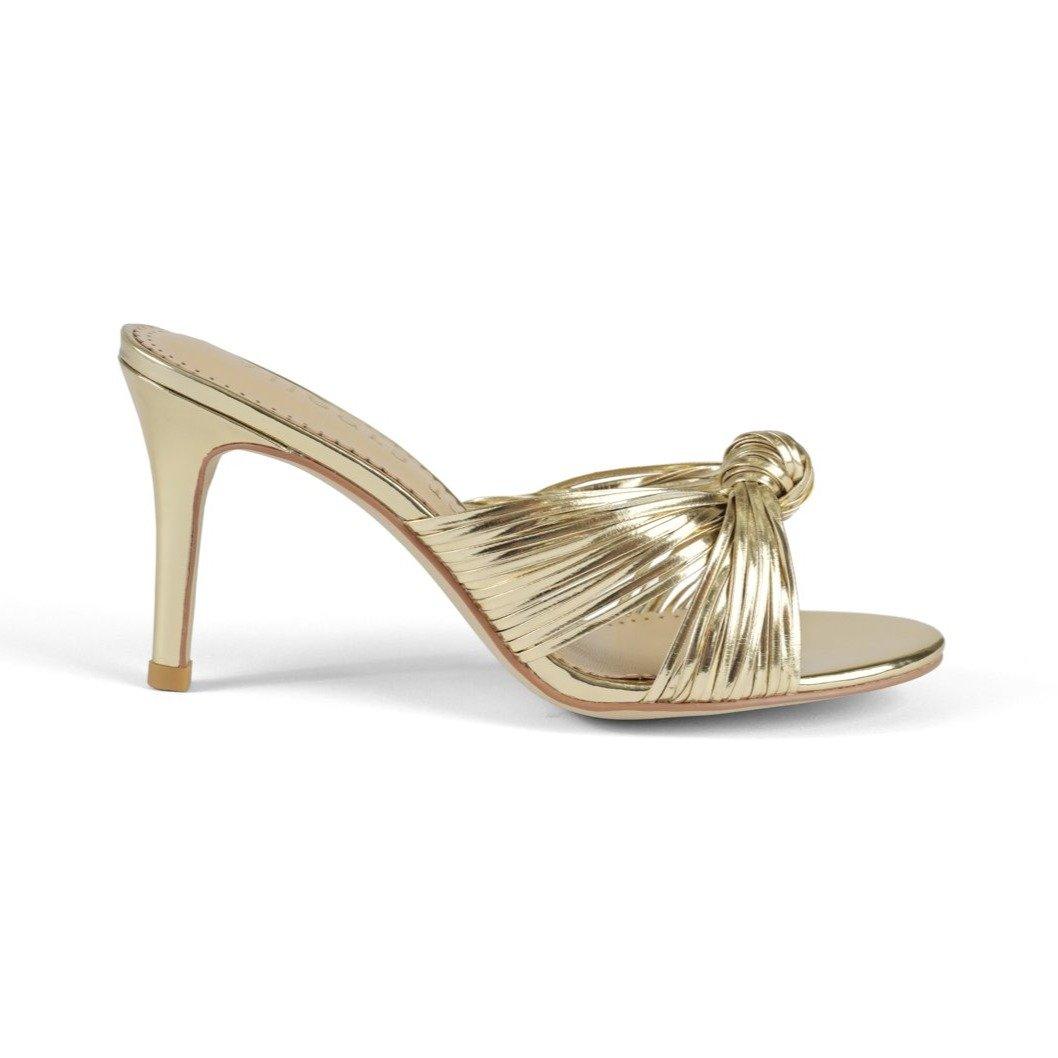 Golden sandals with slip-on style and knot design upper -  side view 