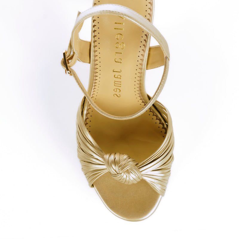 Gold platform sandals with ankle buckle closure - top view