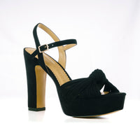 Black platform sandals with ankle buckle closure - corner view